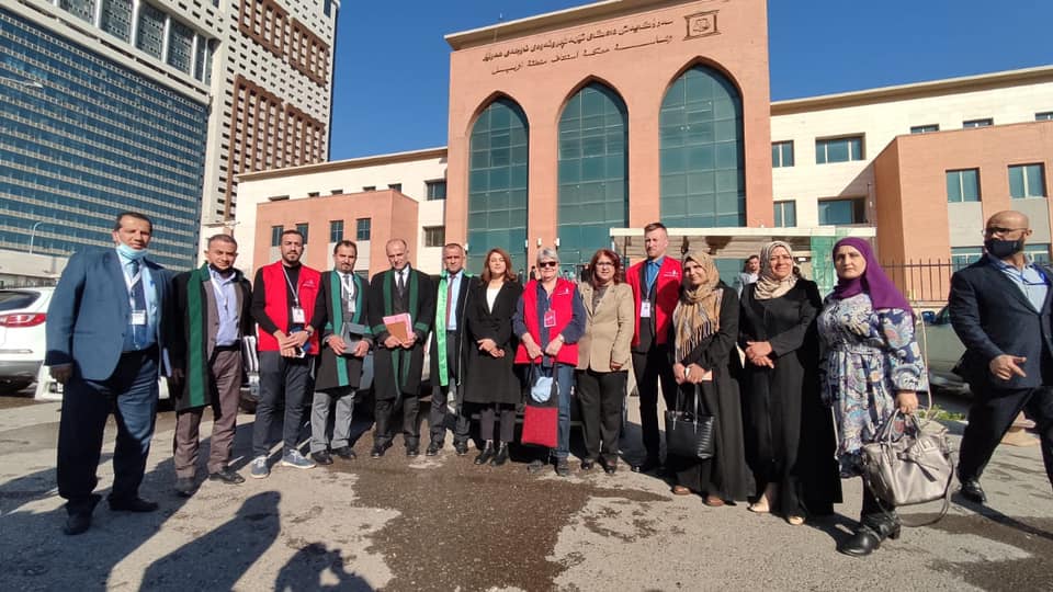 CPTers, lawyers and supporters stand outside the courthouse for Berivan's trial