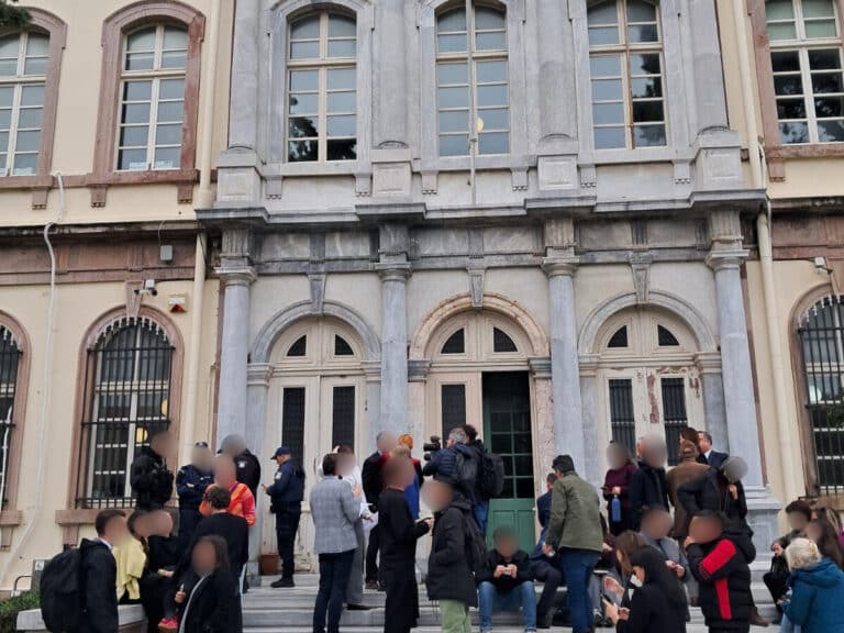 People standing outside a courthouse