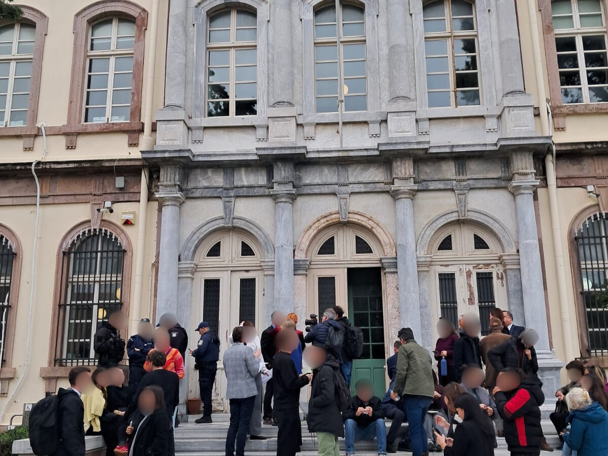 People standing outside a courthouse