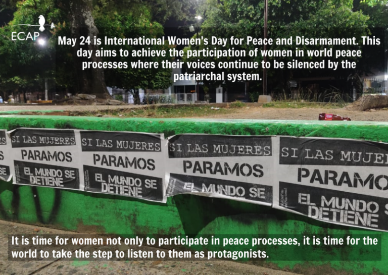 An image of a wall in a park with protest signs pasted to the wall that read in Spanish "If women strike, the world stops"