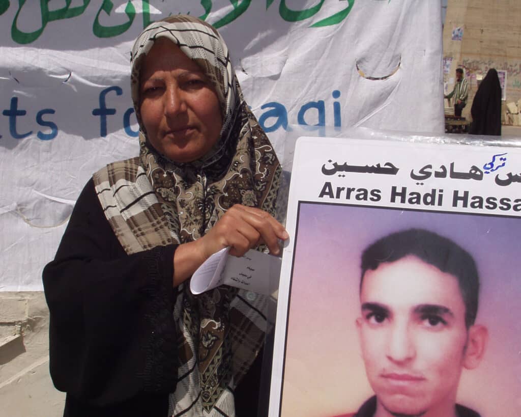 Arras mother holding his picture