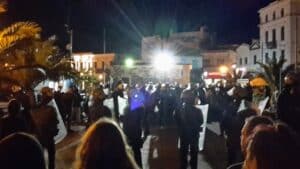 An image of dozens of people gathered in Sappho Square