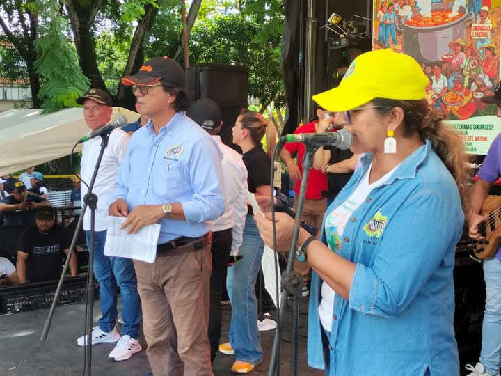 People speaking at a demonstration