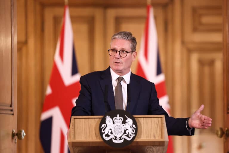 Man speaking from behind a podium