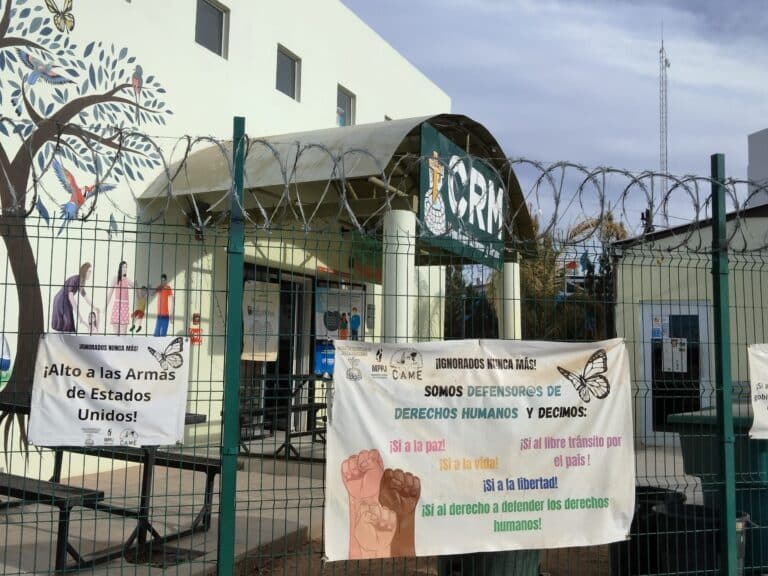 The gates of a migrant support centre