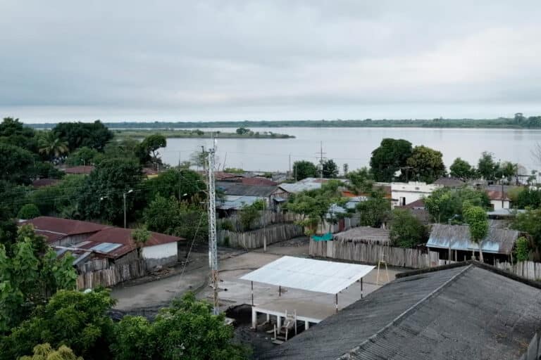 Aerial view of village by a river