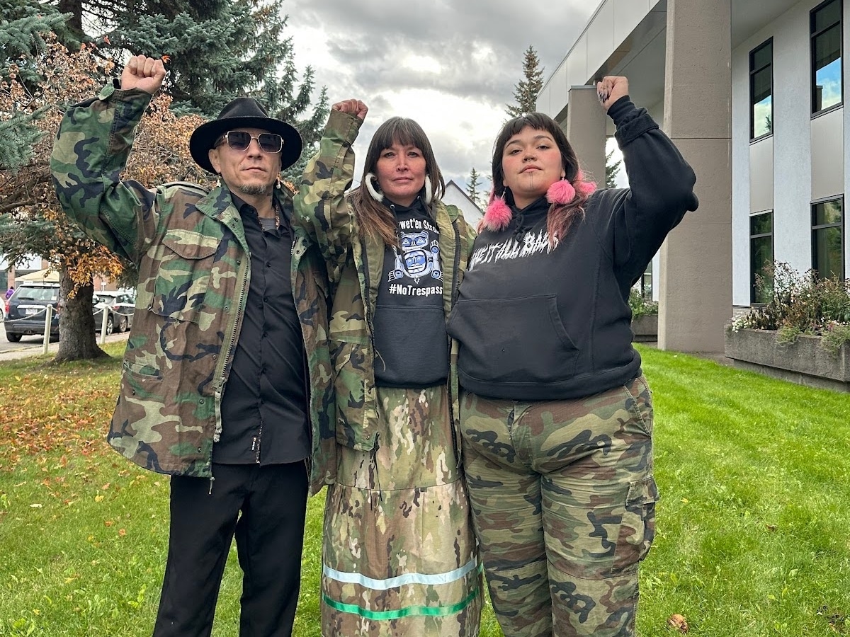 people outside a courthouse