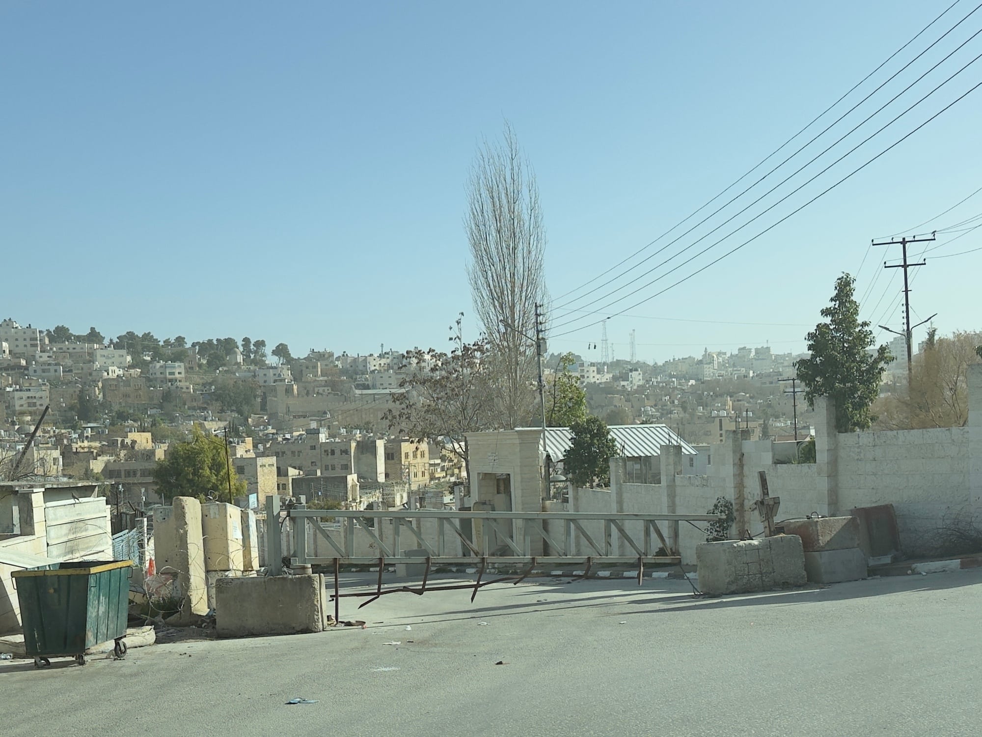 A gate blocking access to a road