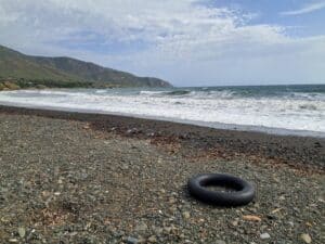 A rubber ring lying on a beach