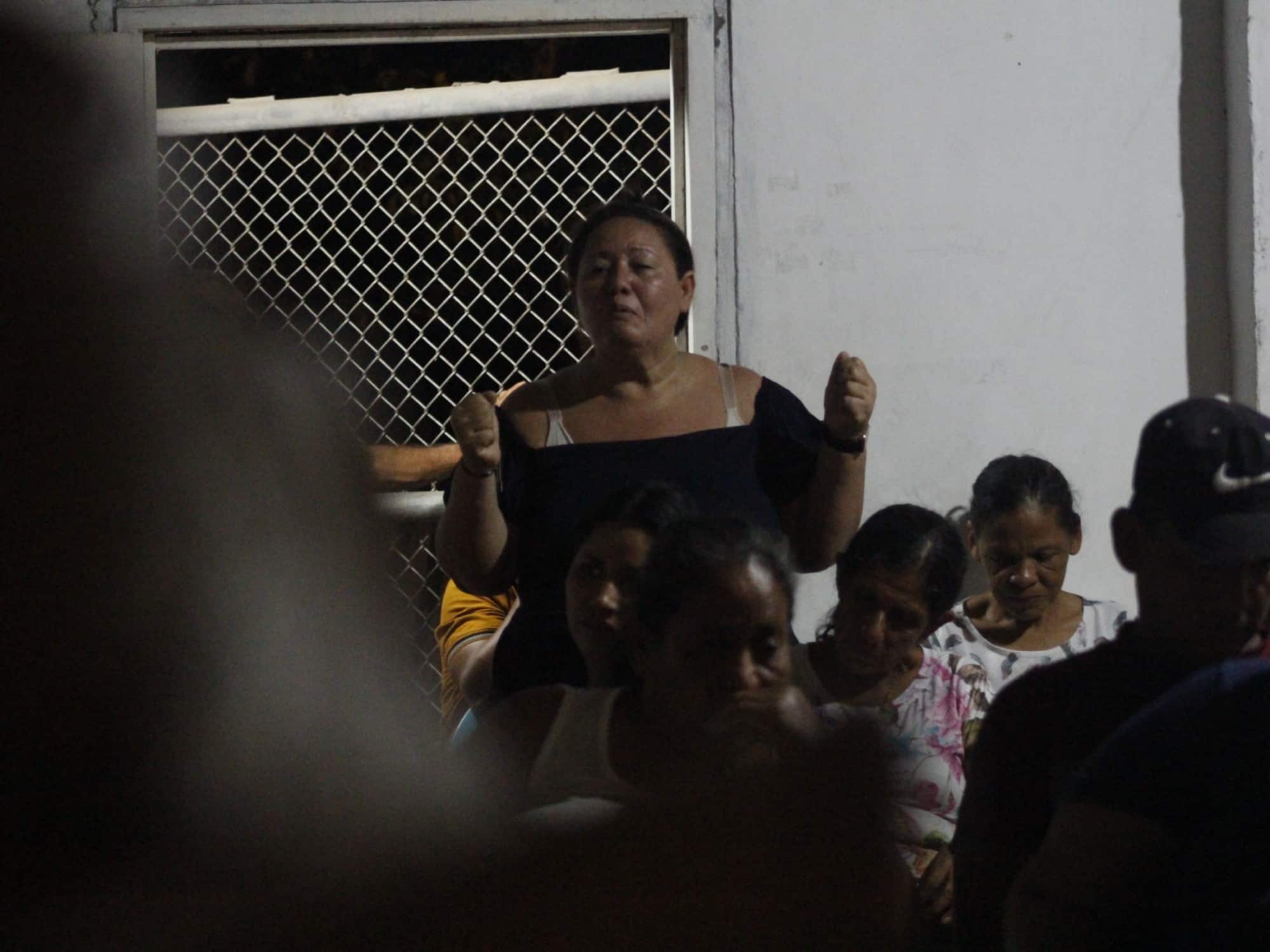 A woman speaking at an assembly