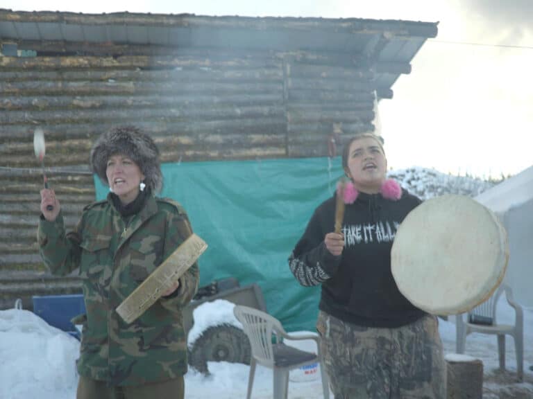 Two people drumming