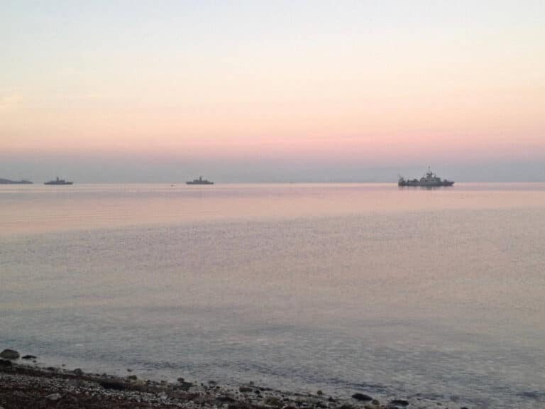 Coast Guard ships in the distance