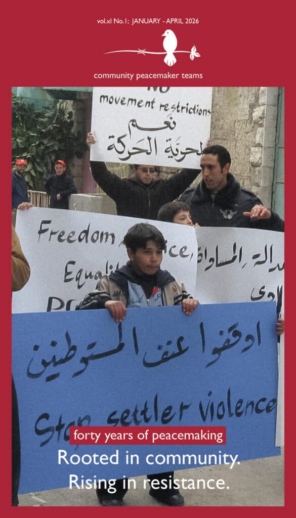 a child in palestine holds a sign