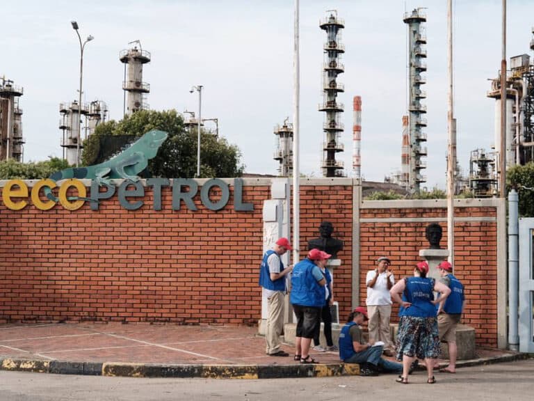 People gathered outside a petrol company headquarters