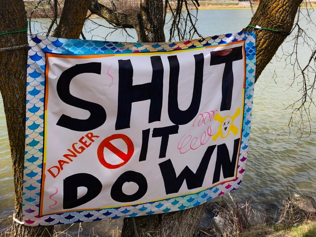 A banner tied to a tree