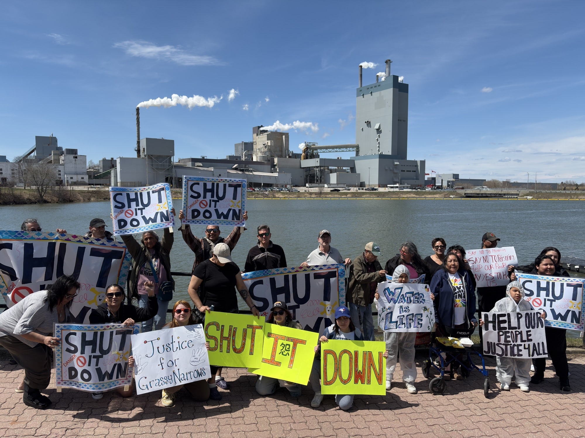People at a protest against the Dryden Mill