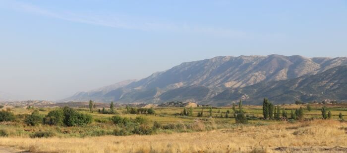 Rice and sesame fields where two months ago a Turkish bomb struck.