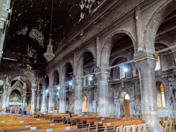 Burned sanctuary of Church in Qaraqosh, Iraq Photo: Weldon Nisly.